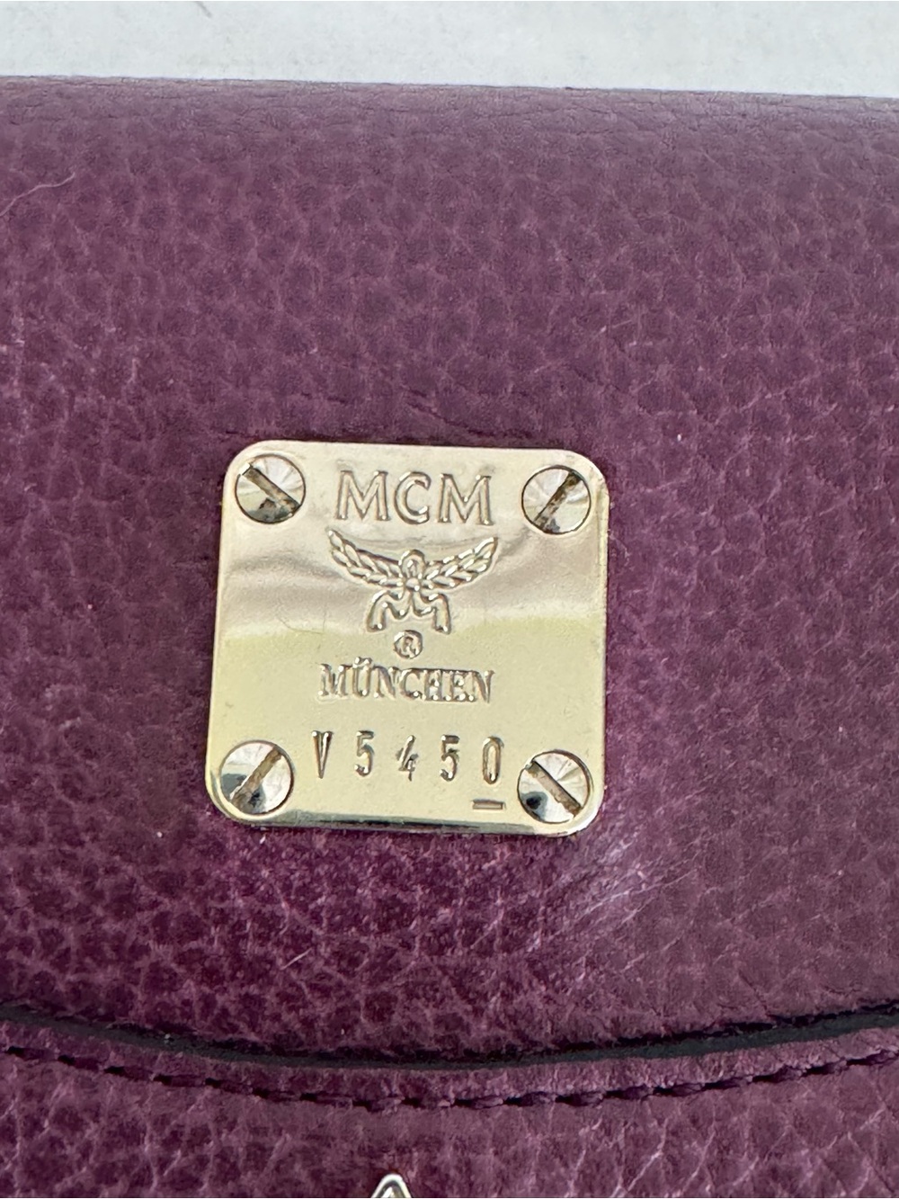 MCM Plum Textured Leather Continental Wallet with Gold Accents - Picture 2 of 11